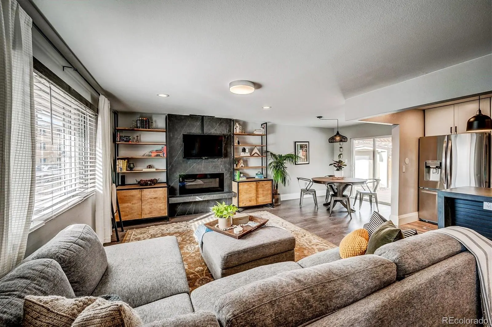 Living room with stone fireplace