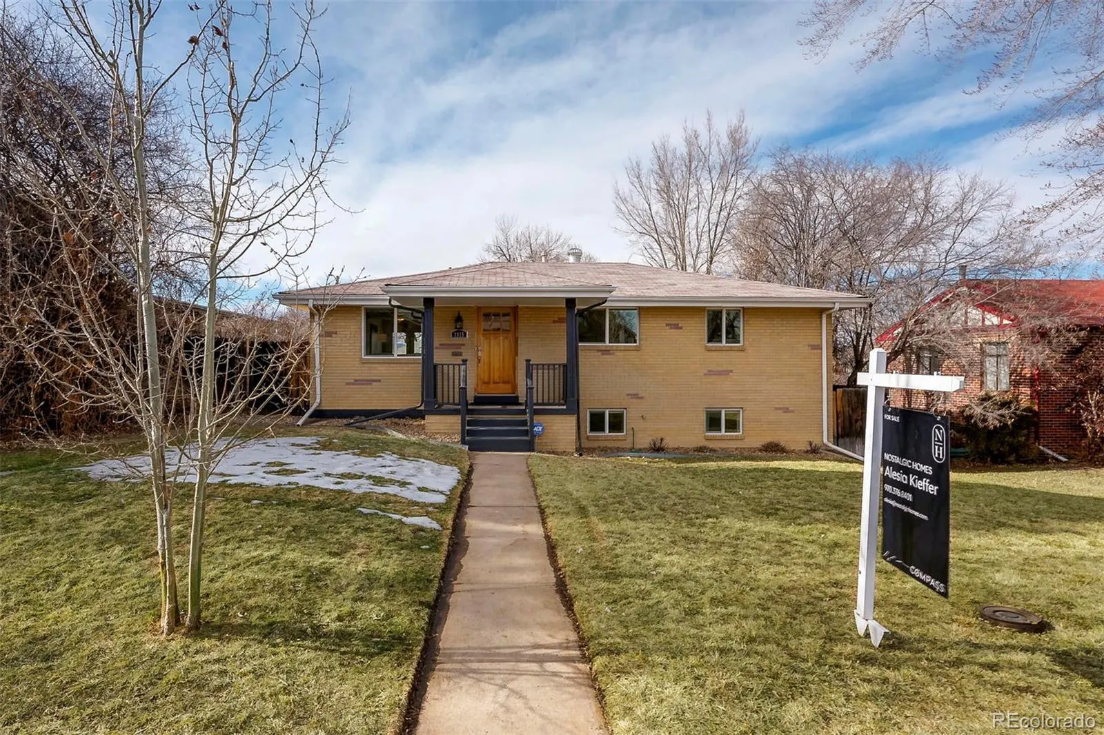 Front of the brick ranch at 1915 Meade Street