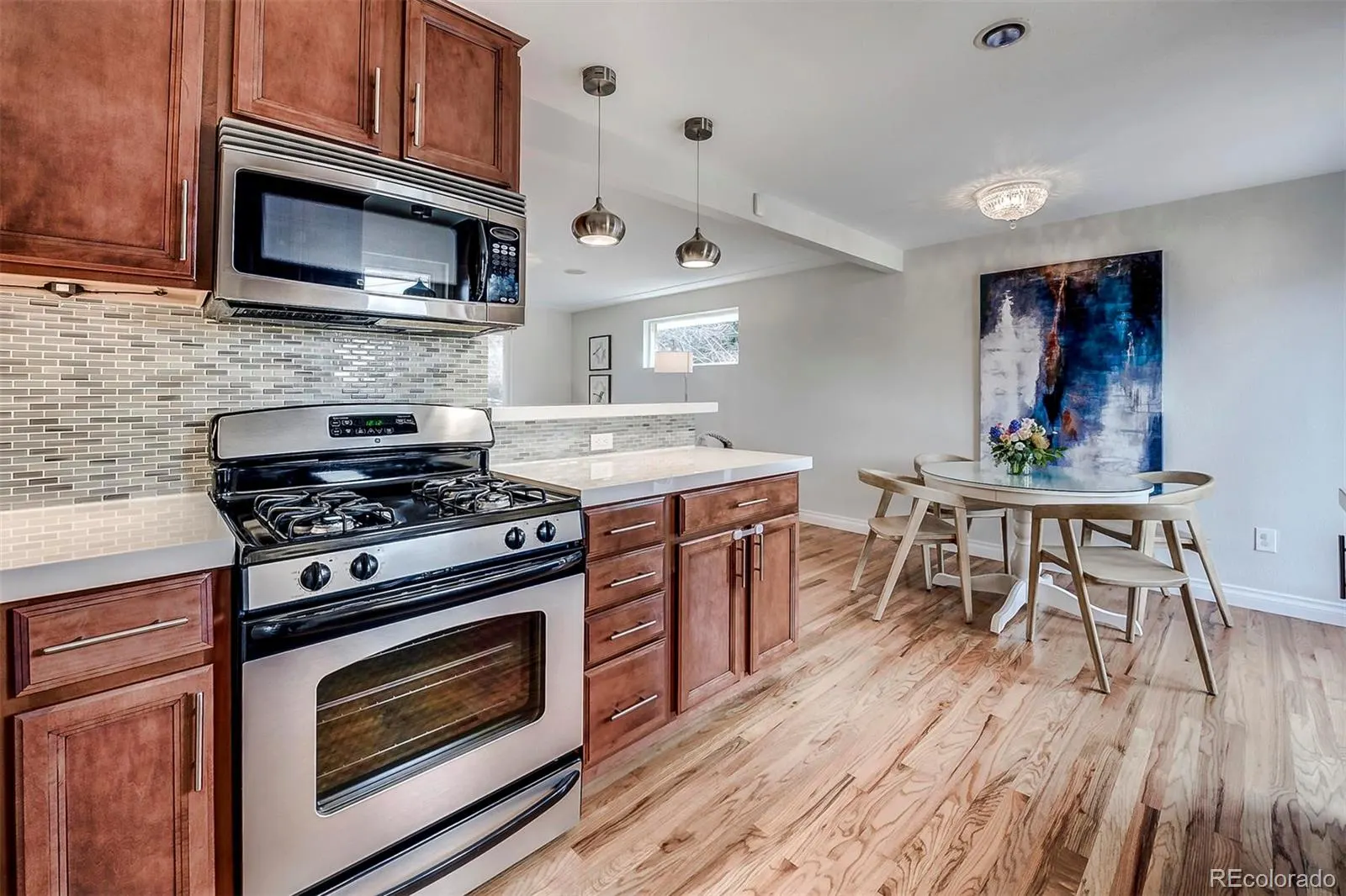 Kitchen with Dekton counters and stainless appliances
