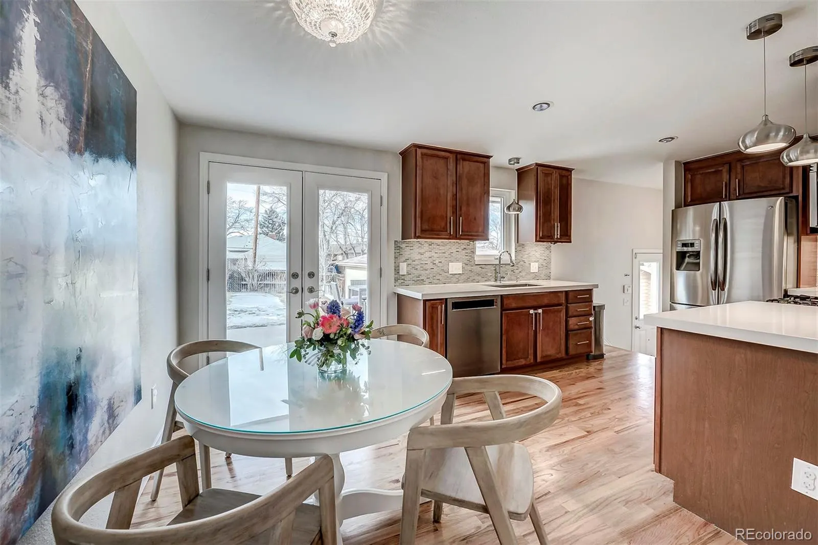 Dining area with French doors to the backyard
