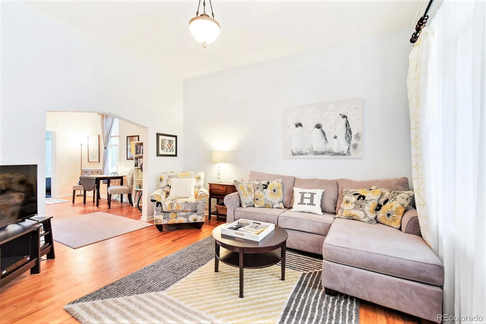 Living room with eleven-foot ceilings and oak floors