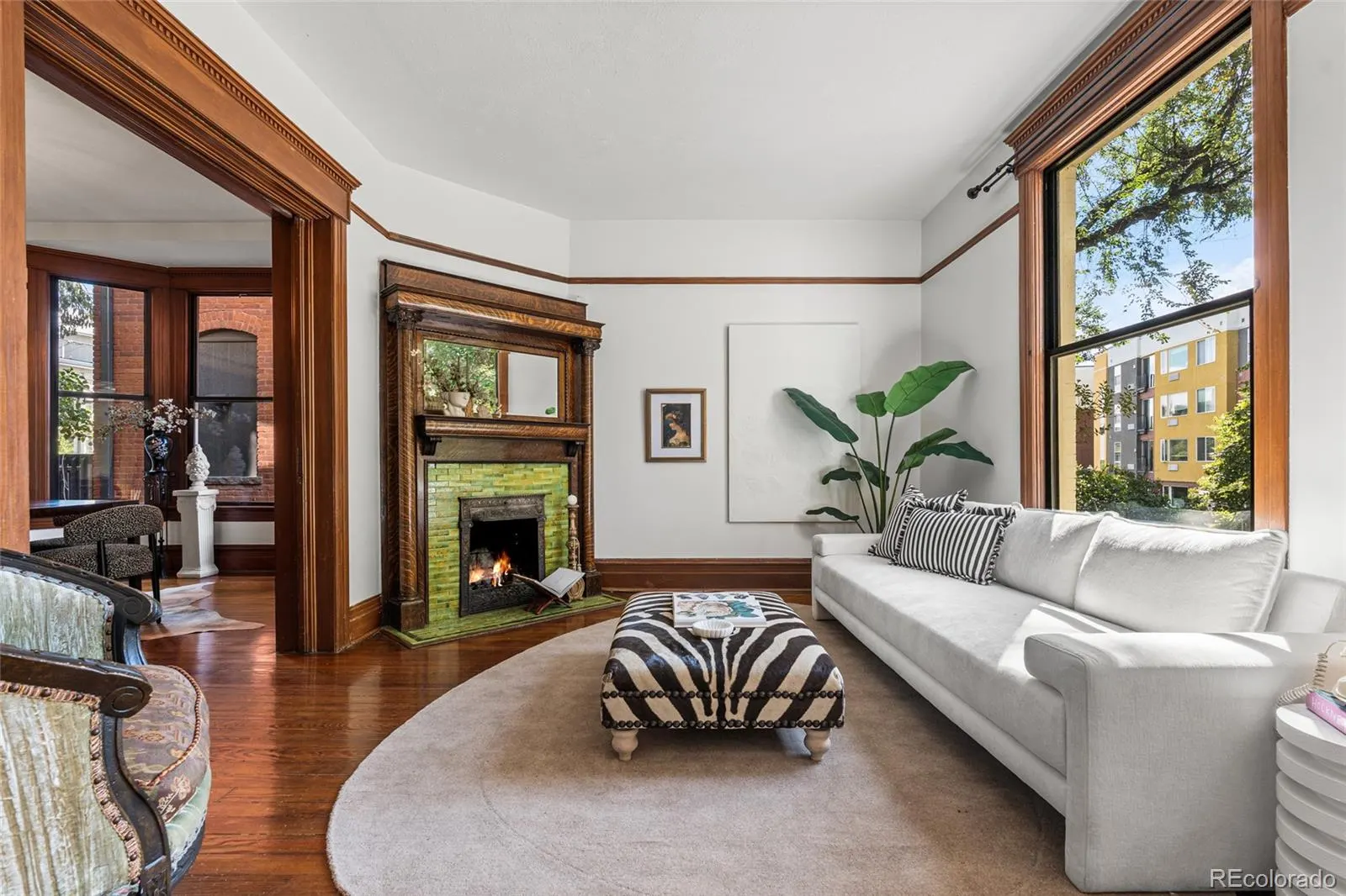 Living room with bay window and fireplace