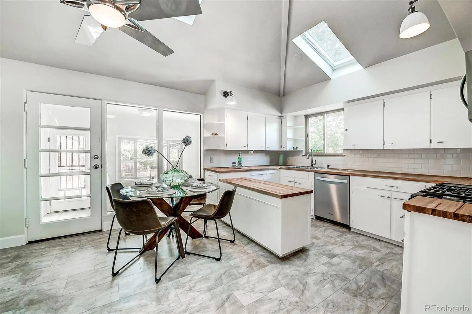 Kitchen and breakfast area under skylights