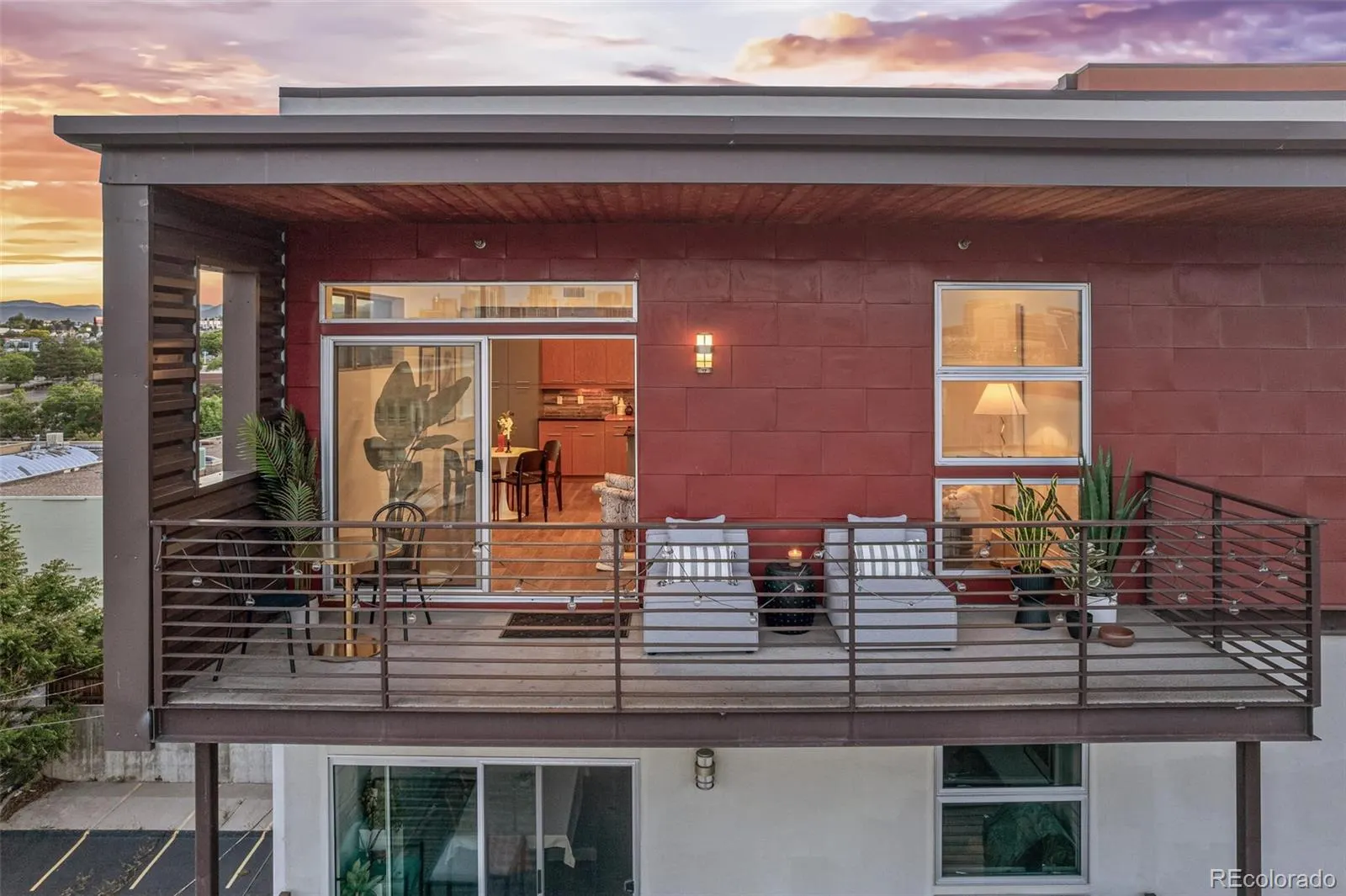 Corner penthouse deck at dusk at 2650 West Front View Crescent Drive