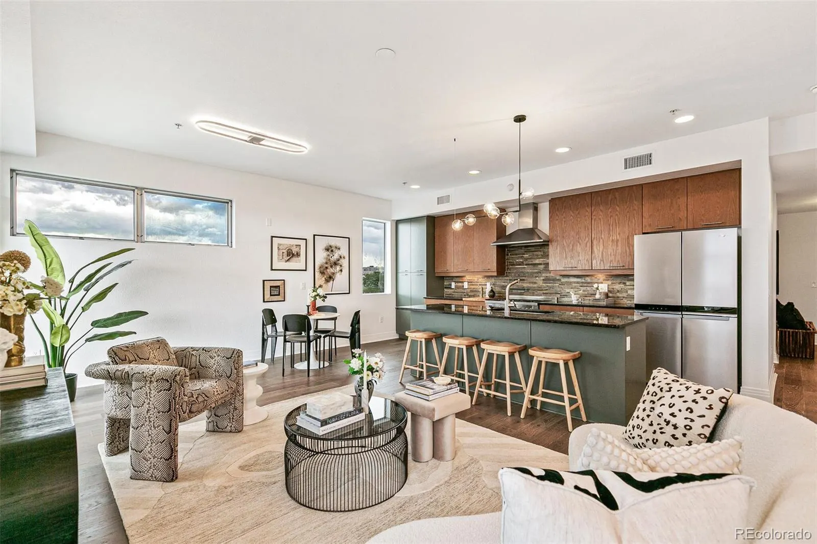 Living, dining and kitchen in one open level
