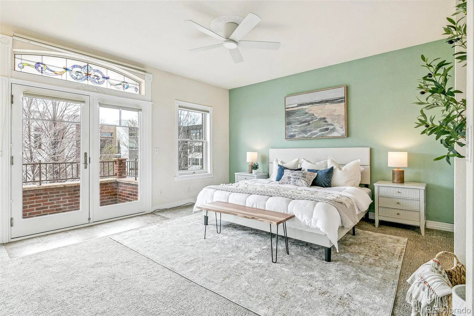 Primary suite with French doors to the balcony