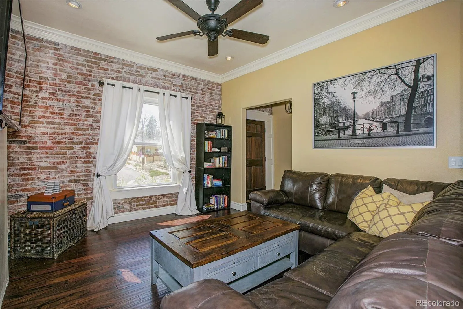 Living room with exposed brick