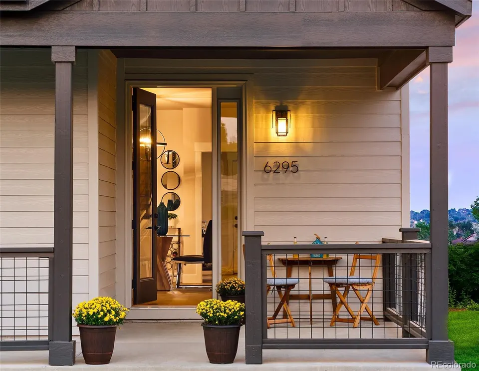 Covered front porch with café table