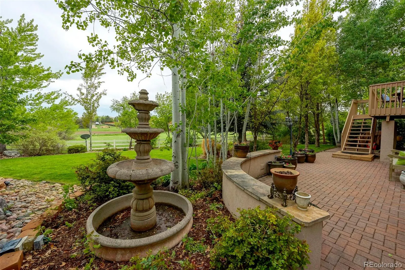 Backyard fountain and shaded patio