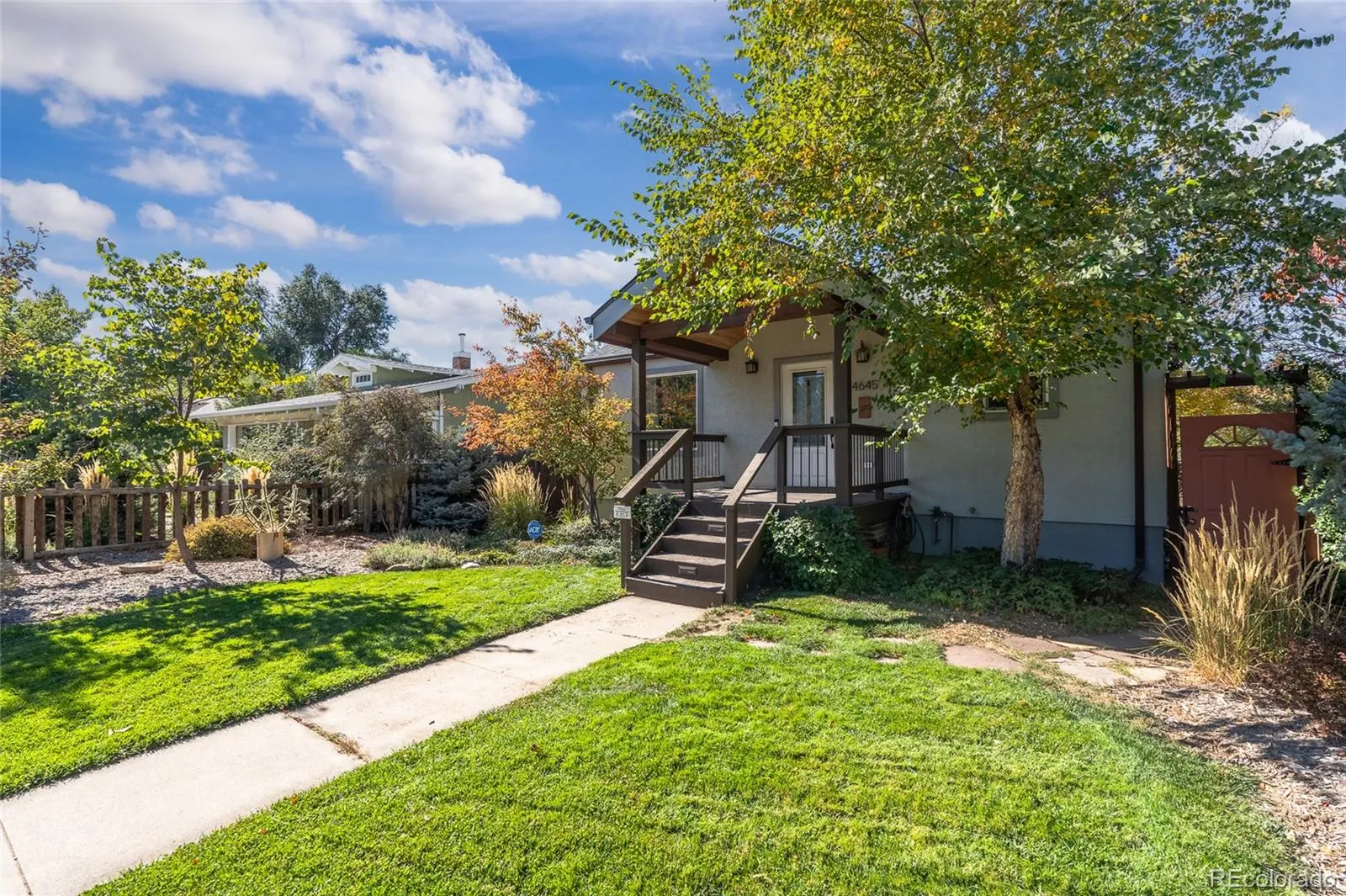 Front walk and landscaped yard
