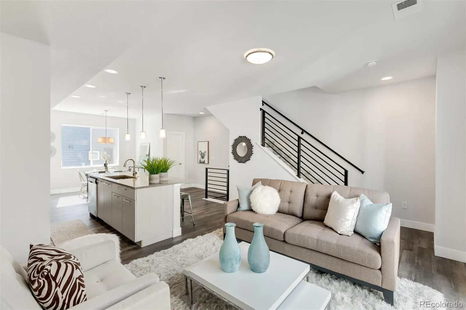 Second-level living room and kitchen