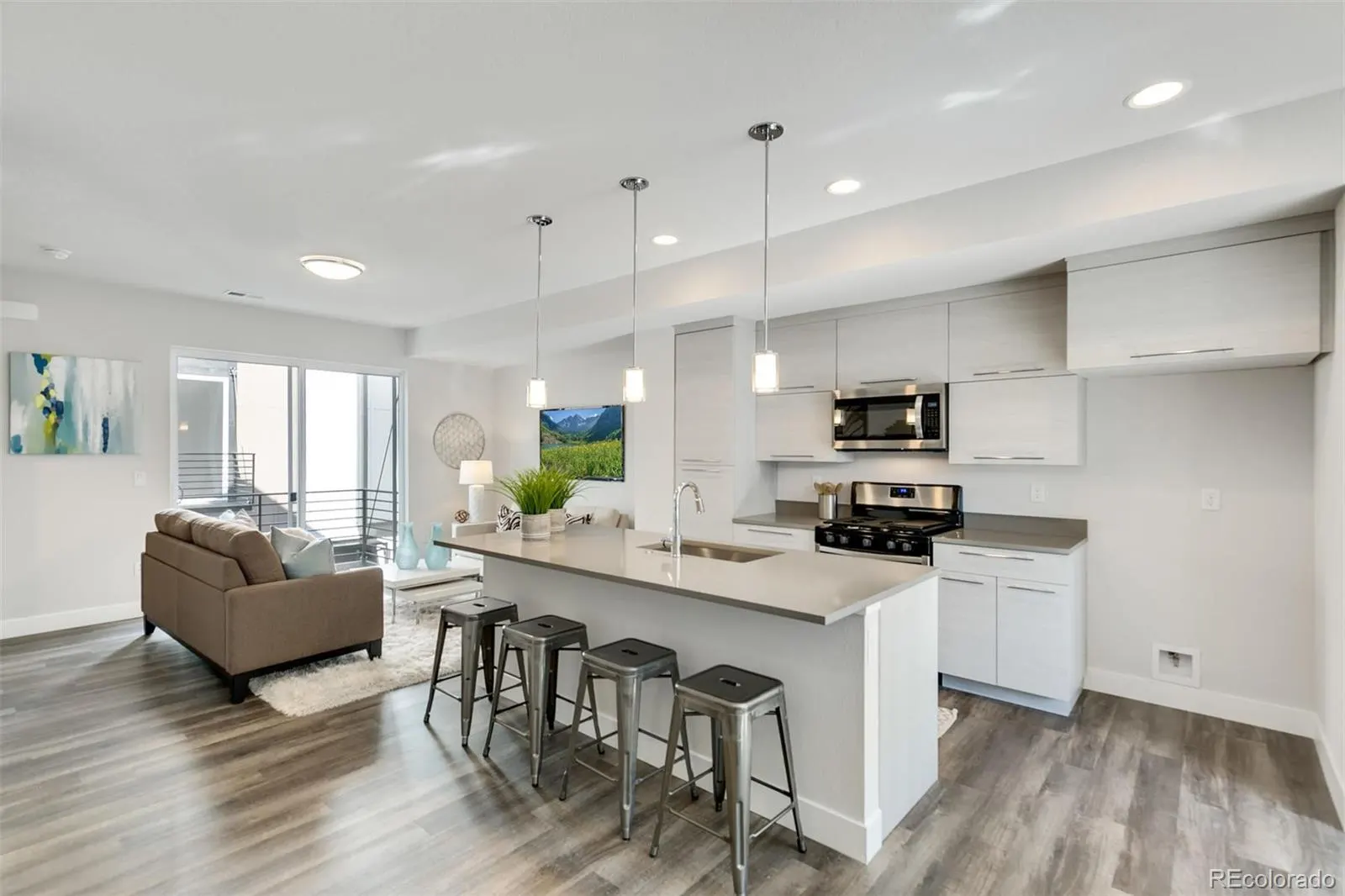Kitchen island with bar stools